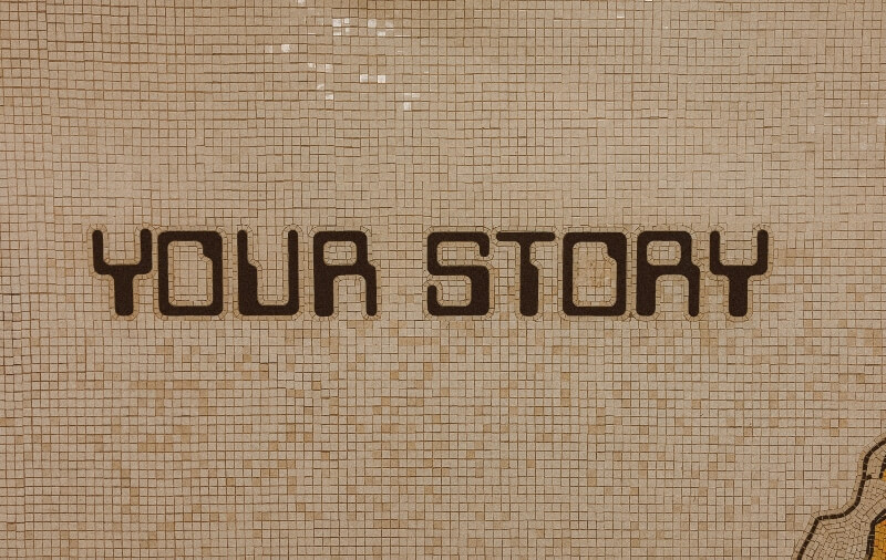 A tile floor that spells the words “your story.”